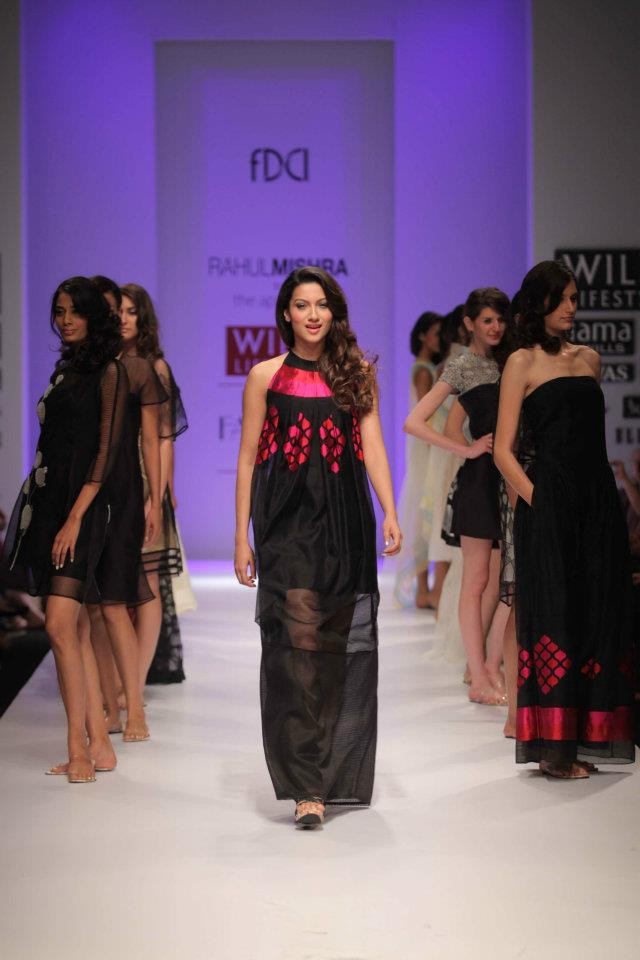 Models walks the ramp during the fourth day of the ongoing Wills Lifestyle India Fashion Week -2012 in New Delhi. Day 4 WIFW