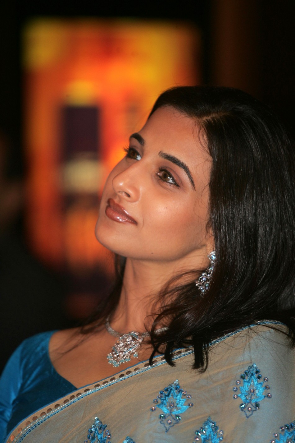 Bollywood actress Vidya Balan watches a fashion show in the eastern Indian city of Calcutta July 20, 2005. The fashion show recreated the clothes and ethnic jewellery from the Bollywood film Vidya Balan’s Journey to Stardom