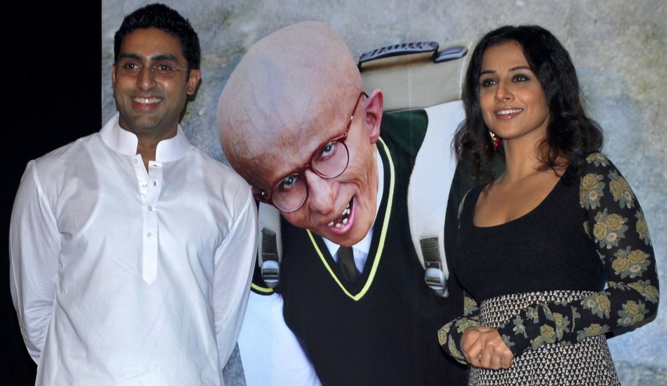 Bollywood actors Abhishek Bachchan (L) and Vidya Balan smile during a promotional event for their movie Vidya Balan’s Journey to Stardom