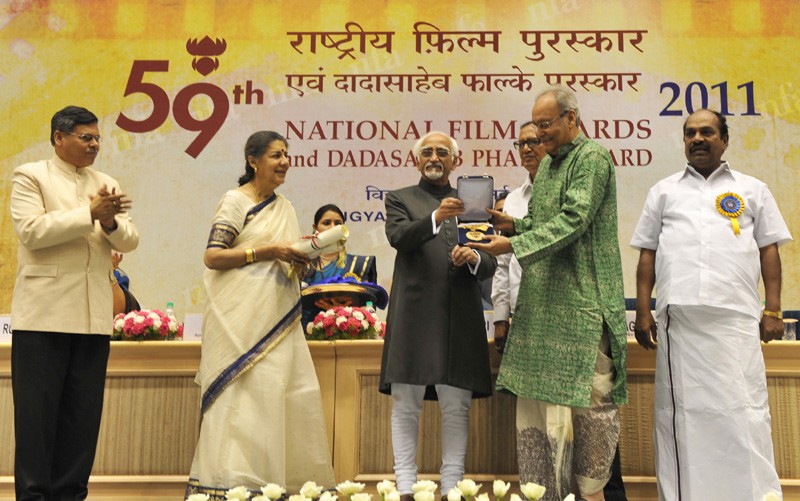 The Vice President, Mohd. Hamid Ansari presenting the Dadasaheb Phalke Award 2011 to Soumitra Chatterjee, at the 59th National Film Awards function, in New Delhi on May 03, 2012. The Union Minister for Information and Broadcasting, Ambika Soni, the Ministers of State for Information and Broadcasting, Chowdhury Mohan Jatua and Dr. S. Jagathrakshakan and the Secretary, Ministry of Information & Broadcasting, Uday Kumar Varma are also seen. The Week That Was (PHOTOS)