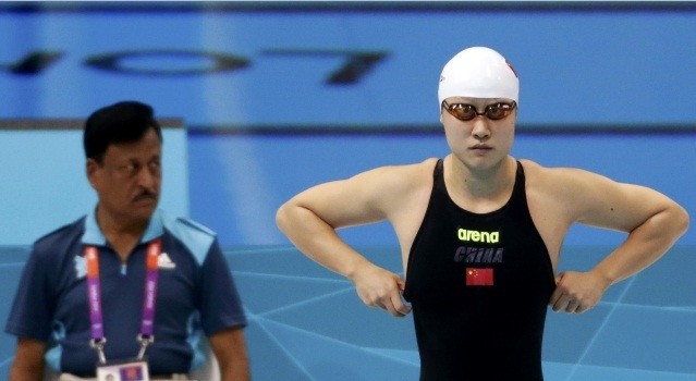 China's Liu Zige swims in the women's 200m butterfly heats during the London 2012 Olympic Games Liu Zige