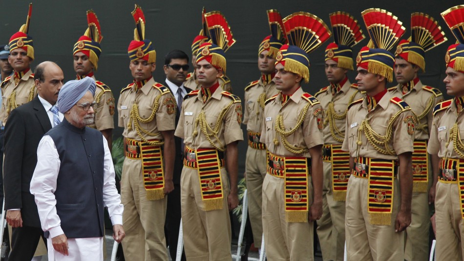 India's PM Singh inspects a guard of honour upon his arrival at the historic Red Fort during Independence Day celebrations in Delhi Independence Day