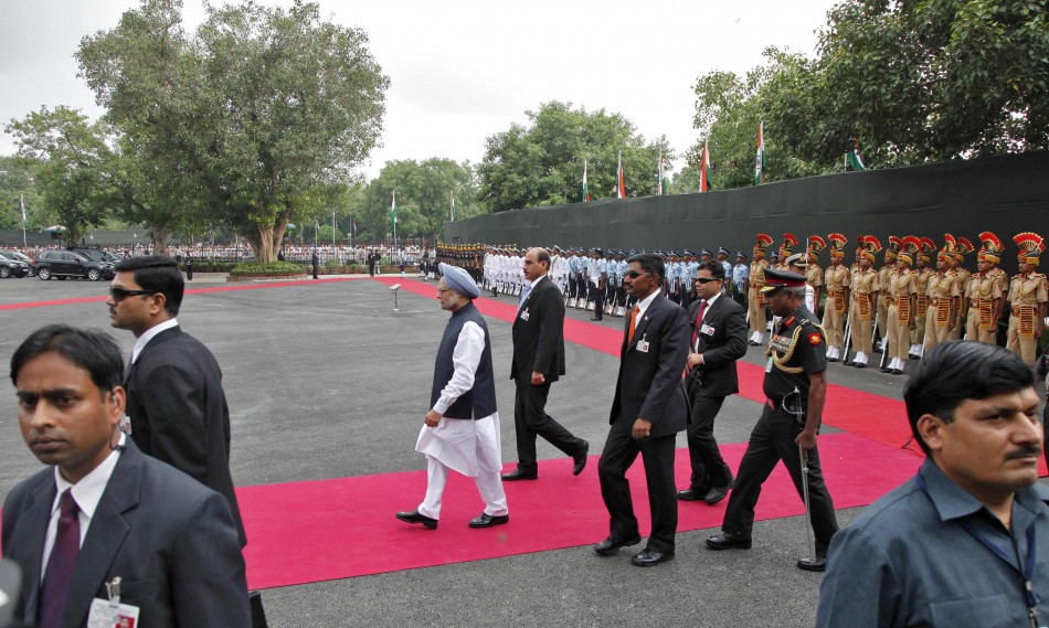 India's PM Singh inspects a guard of honour upon his arrival at the historic Red Fort during Independence Day celebrations in Delhi Independence Day
