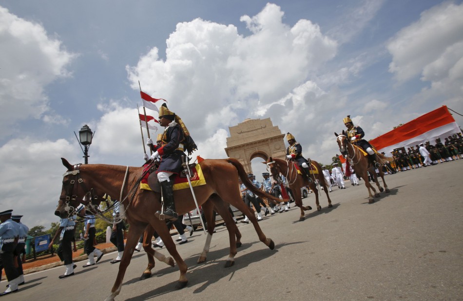 Soldiers mounted on horses take part in ceremony at India Gate war memorial during Independence Day celebrations in New Delhi Independence Day