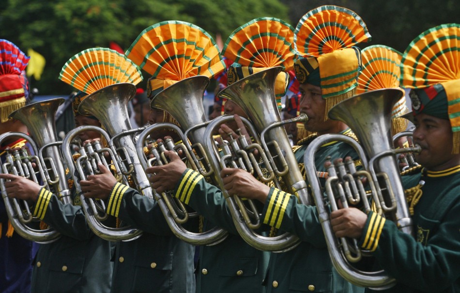 Policemen play tubas during the country's Independence Day celebrations in Agartala Independence Day