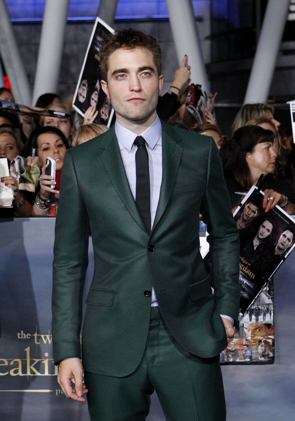 Cast member Pattinson poses at the premiere of Robert Pattinson