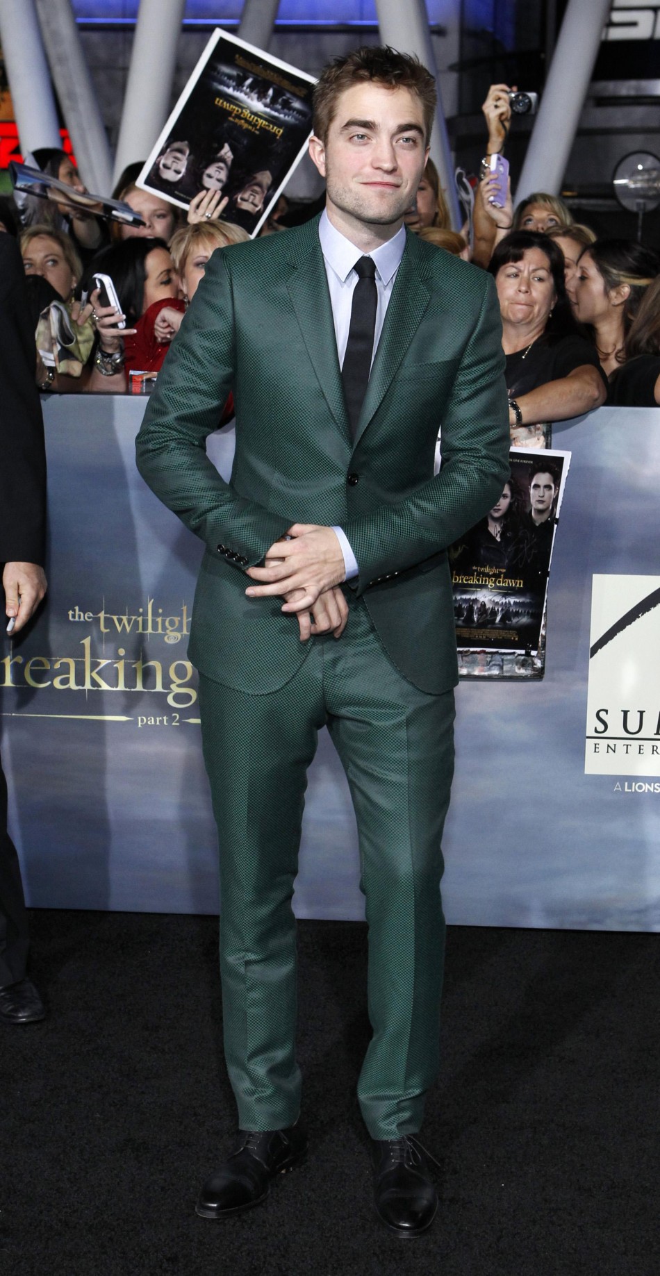 Cast member Pattinson poses at the premiere of Robert Pattinson