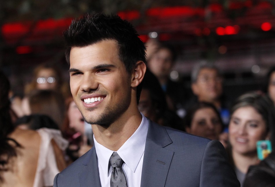 Cast member Lautner poses at the premiere of Taylor Lautner