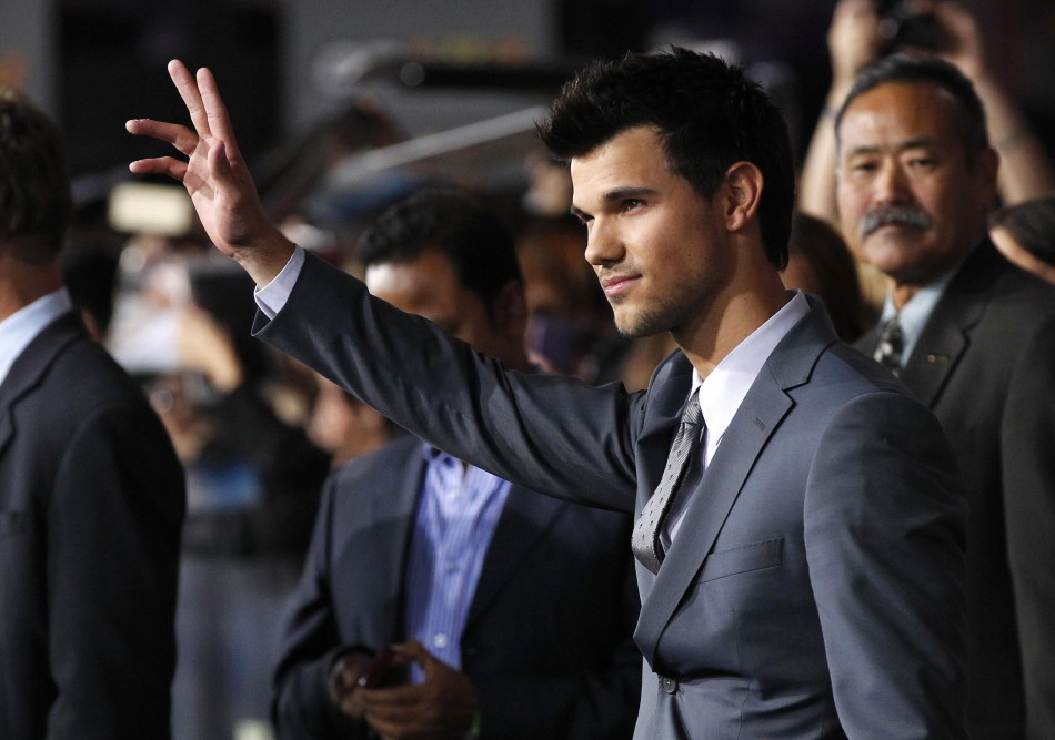 Cast member Lautner poses at the premiere of Taylor Lautner