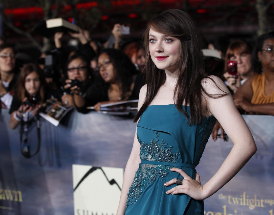 Cast member Dakota Fanning poses at the premiere of Dakota Fanning