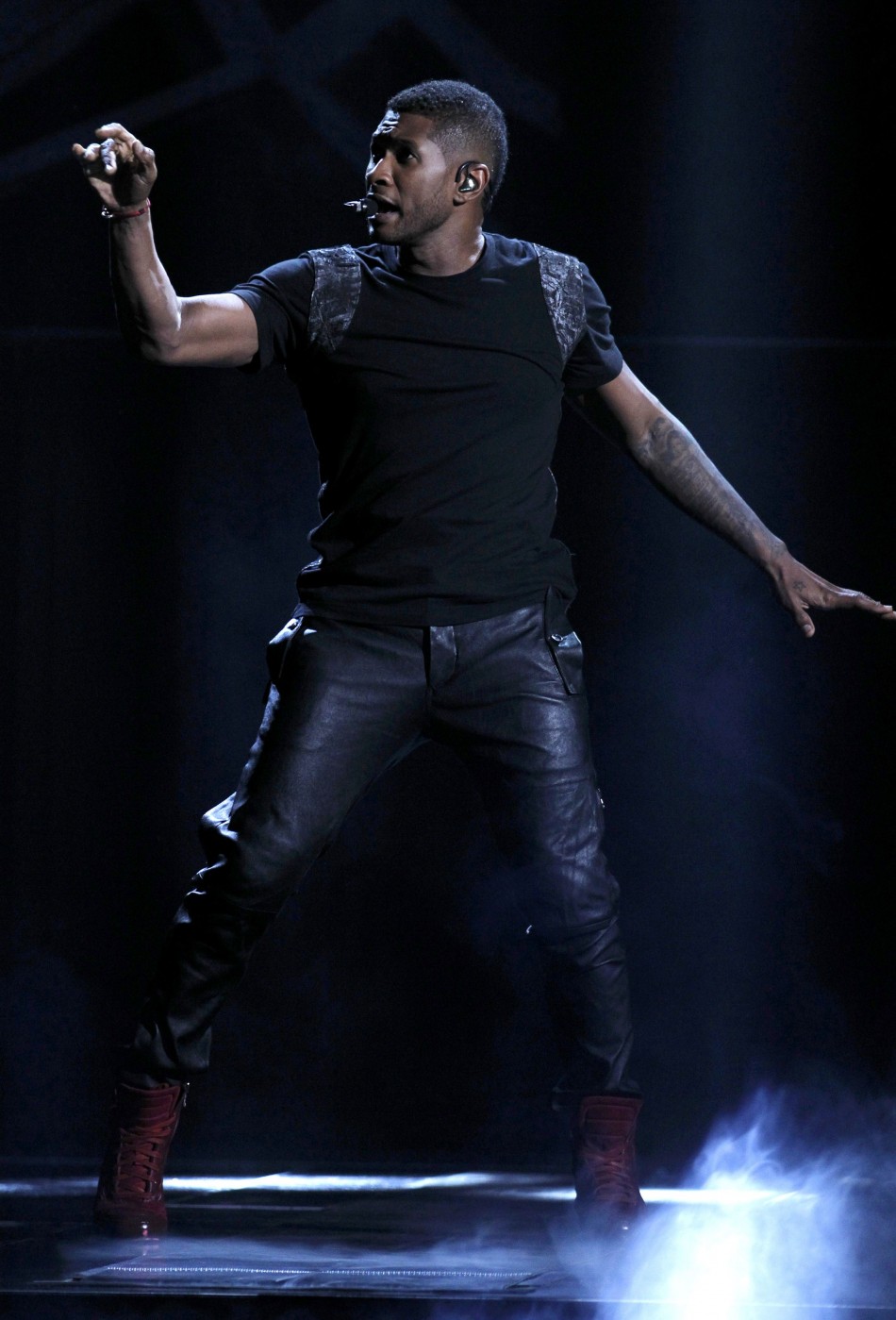 Usher performs at the 40th American Music Awards in Los Angeles Usher