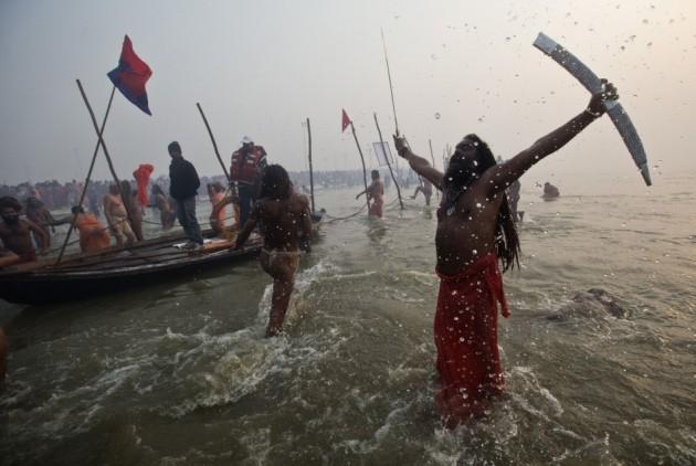 Hindu holy brandishes sword as he attends first Kumbh Mela