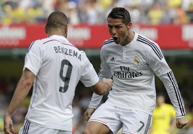 Real Madrid forward Cristiano Ronaldo celebrates with teammate Karim Benzema after scoring against Villarreal in their La Liga game Karim Benzema Cristiano Ronaldo Real Madrid