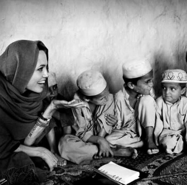 When Angie went to places where people were suffering from war and persecution.