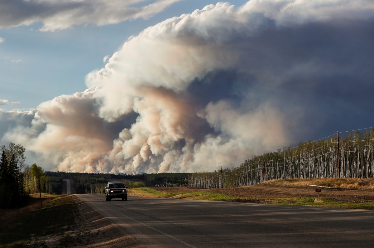 Canadian wildfire grows tenfold, forces more evacuations