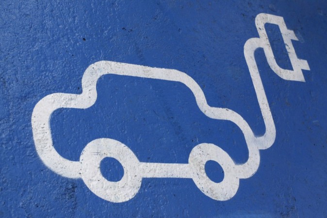 The logo of an electric car is painted on the road during the opening ceremony of the first Latin American public charging station