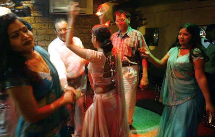 Indian bar girls perform at a dance bar in Bombay May 5, 2005. The government of the western Indian state of Maharashtra on Wednesday endorsed the decree seeking to ban dance bars in the state Indian bar girls perform at a dance bar in Bombay.