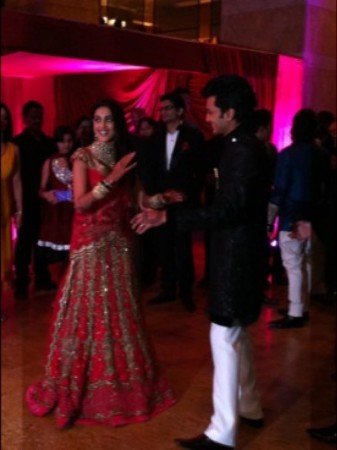Bollywood actors Riteish Deshmukh (R), Genelia D'Souza during their wedding reception ceremony. Riteish Deshmukh, Genelia D'Souza