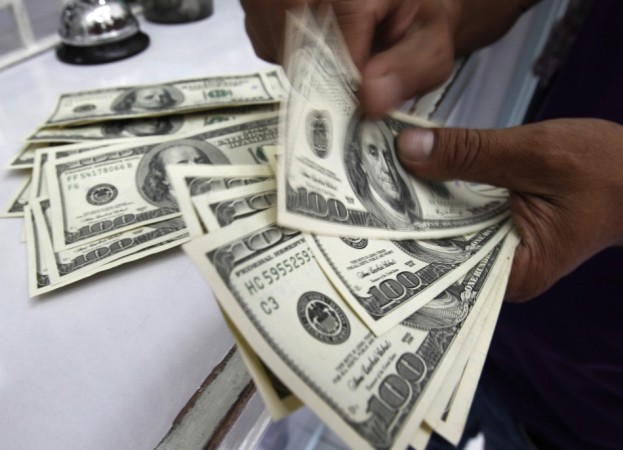 Dollar Bills Being Counted