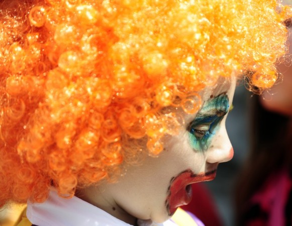 A child in a costume reacts during a traditional April Fool's Day celebration in Skopje April 1. April Fools Day