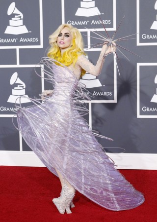 Lady Gaga poses on the red carpet at the 56th annual Grammy Awards in Los Angeles Lady Gaga poses on the red carpet at the 52nd annual Grammy Awards in Los Angeles