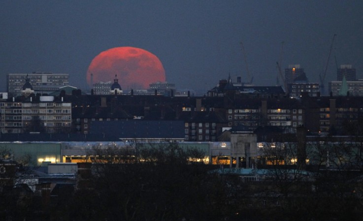 The moon that rose over east London on March 19, 2011. Tuesday will see the rise of a full moon called a The moon rises over east London