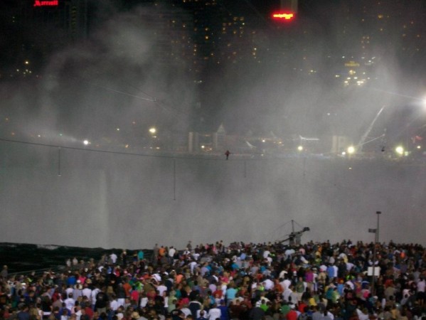 Nik Wallenda has made a historic tightrope crossing over roaring Niagara Falls on Friday night (Facebook) Nik Wallenda