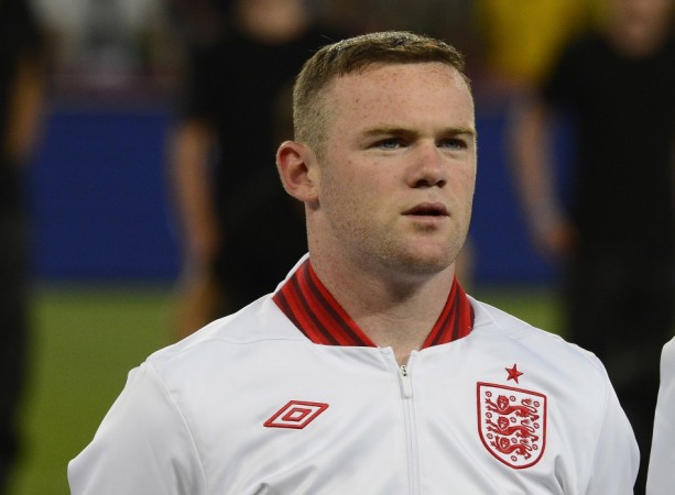 Wayne Rooney warned about using Twitter account to promote Nike
