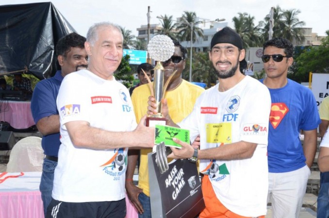 Dalip Tahil and Winner At the Football Marathon. Image: Scribes INC Dalip Tahil and Winner At the Football Marathon. Image: Scribes INC