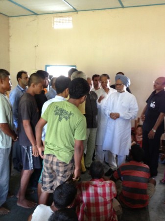 PM Manmohan Singh meeting victims of violence in Kokrajhar relief camp in Assam