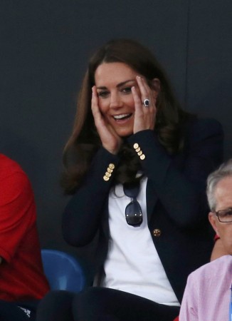 Britain's Catherine, Duchess of Cambridge reacts as she attends women's semifinal hockey match between Great Britain and Argentina at Riverbank Arena at London 2012 Olympic Games Kate Middleton