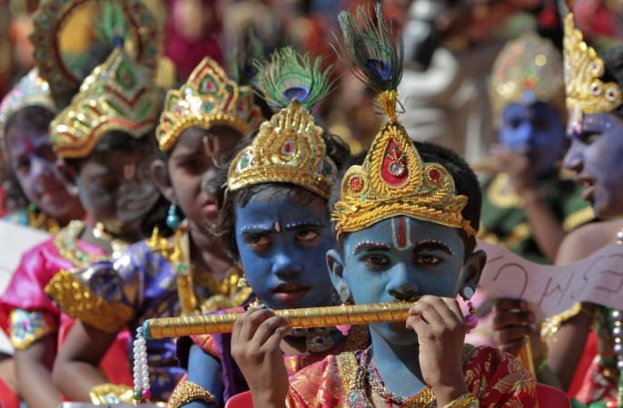 School children dressed as Hindu Lord Krishna take part in a function held ahead of Janmashtami celebrations in India
