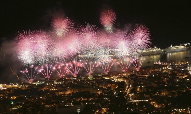 Fireworks explode over the Funchal city bay during year end celebrations in Madeira Island Fireworks explode over the Funchal city bay during year end celebrations in Madeira Island