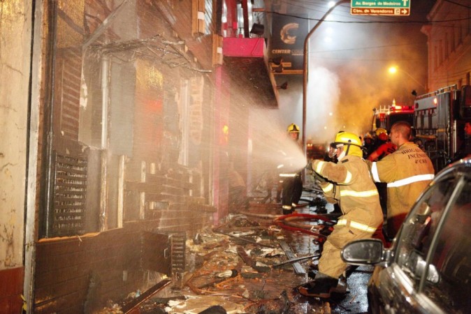 Fire-fighters try to extinguish a fire at Kiss nightclub in the southern city of Santa Maria Fire-fighters try to extinguish a fire at Kiss nightclub in the southern city of Santa Maria