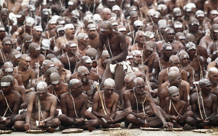 Newly initiated Naga Sadhus or Hindu holy men of the Juna Akhara attend Dikasha, a ritual on the banks of the river Ganges, during the ongoing Newly-Initiated Naga Sadhus