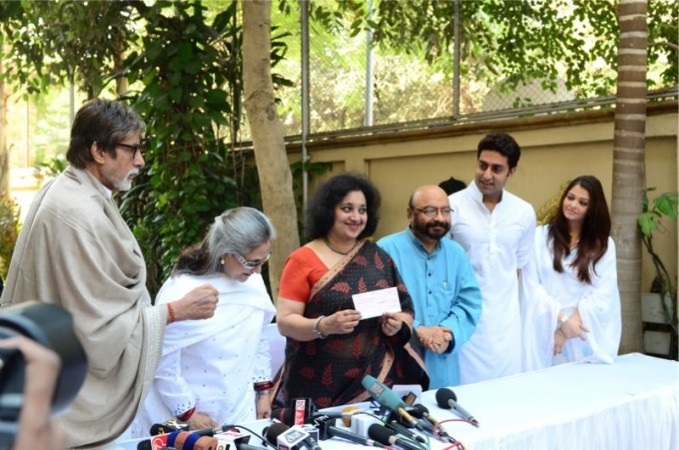 Amitabh Bachchan along with Jaya, Abhishek, Aishwarya and Govind Nihalani donating the money (Pic Credit: Facebook/Amitabh Bachchan) Amitabh bachchan