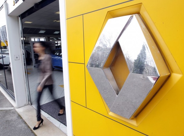 A woman leaves a Renault automobile dealership in Marseille.
