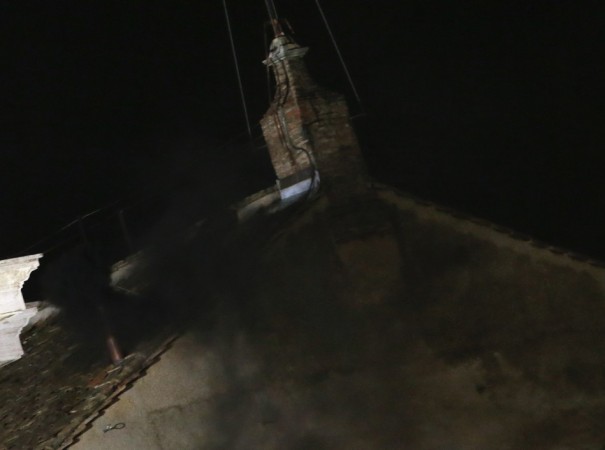 Black smoke rises from the chimney on the roof of the Sistine Chapel, indicating that no decision has been made after the first day of voting for the election of a new pope, in the Vatican City Black smoke