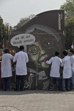 Greenpeace activists protest Delhi VidhanSabha against poor electricity supply in the city.