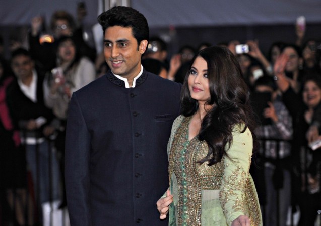 Bollywood actor Abhishek Bachchan arrives with his wife actress Aishwarya Rai for the inaugural Times of India Film Awards in Vancouver