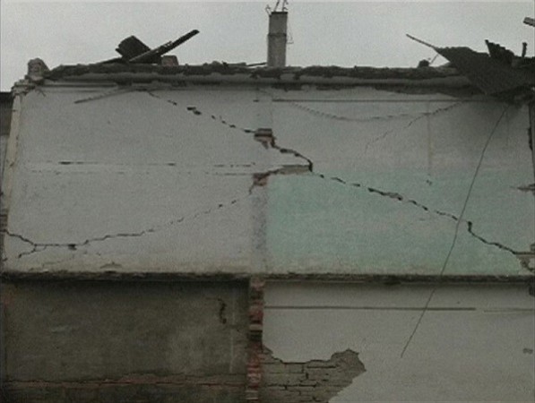 A view of cracks on a wall after a 6.6 magnitude earthquake hit southwestern China's Sichuan province. (credit: Reuters) A view of cracks on a wall after a 6.6 magnitude earthquake hit southwestern China's Sichuan province.