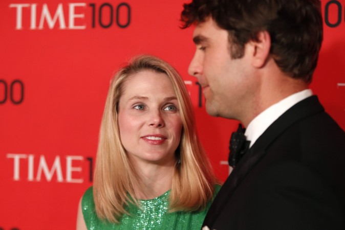 President and CEO of Yahoo, Marissa Mayer, arrives with Zachary Bogue for the Time 100 gala celebrating the magazine's naming of the 100 most influential people in the world for the past year, in New York, April 23, 2013. REUTERS/Lucas Jackson President and CEO of Yahoo, Marissa Mayer