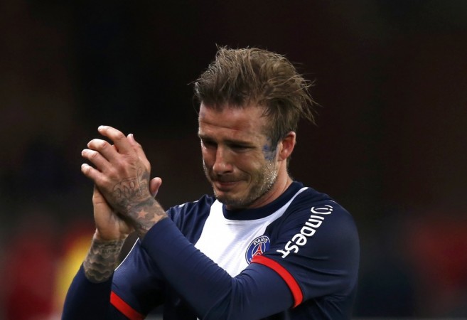 Paris Saint-Germain's David Beckham breaks down in tears as he leaves the pitch after being substituted in the 81st minute during his team's French Ligue 1 soccer match against Brest in Paris David Beckham