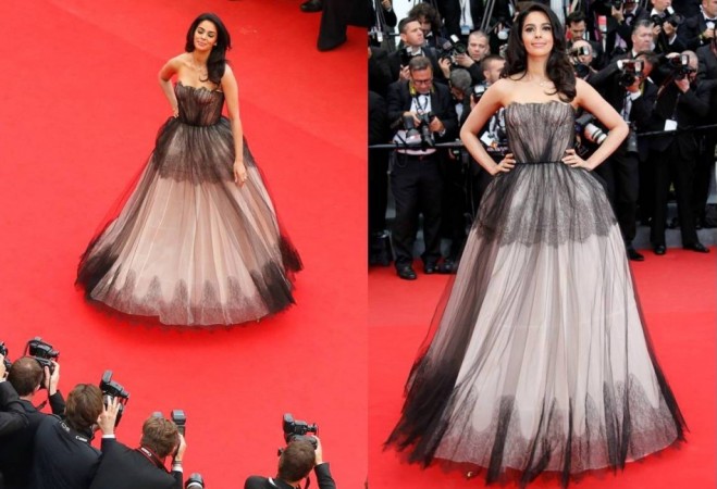 Mallika Sherawat poses on the red carpet as she arrives for the screening of the film Cannes