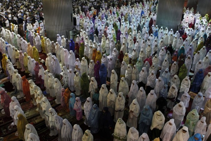 Muslim women attend an evening mass prayer session called Ramadan