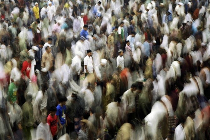 Muslims attend an evening mass prayer session called Ramadan