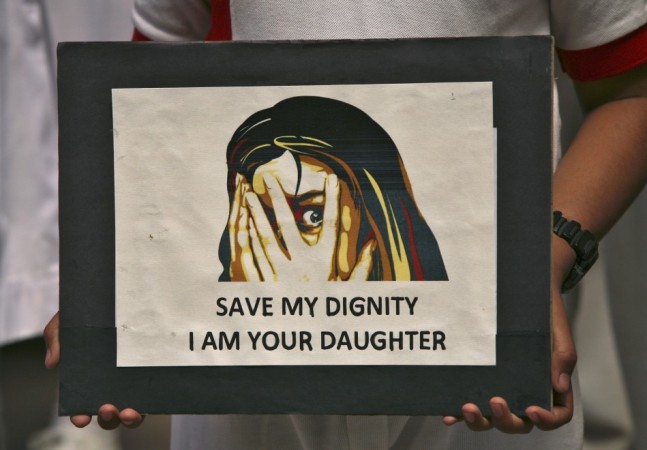 A schoolgirl holds a placard (representational image)