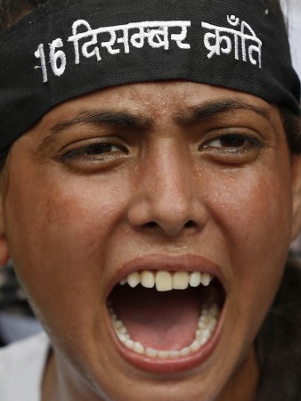 A protester shouts slogan outside a court in New Delhi Delhi gang-rape case