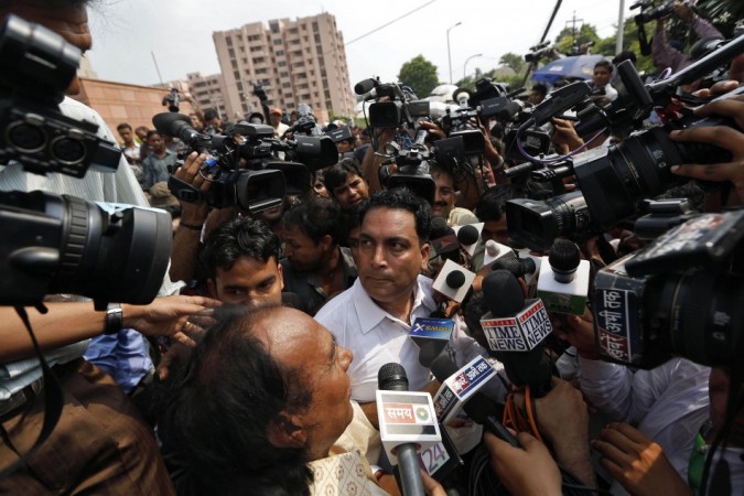 A.P. Singh speaks with the media outside a court in New Delhi Delhi gang-rape case