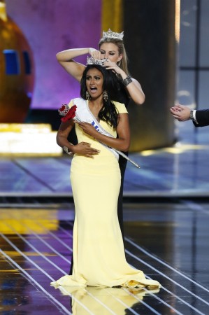 Miss America contestant, Miss New York Nina Davuluri reacts as she is chosen as winner of the 2014 Miss America Pageant in Atlantic City, New Jersey Nina Davuluri